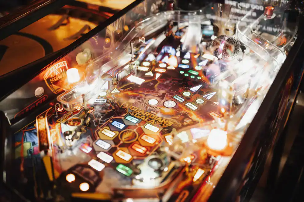 Brightly colored early solid state pinball playfield